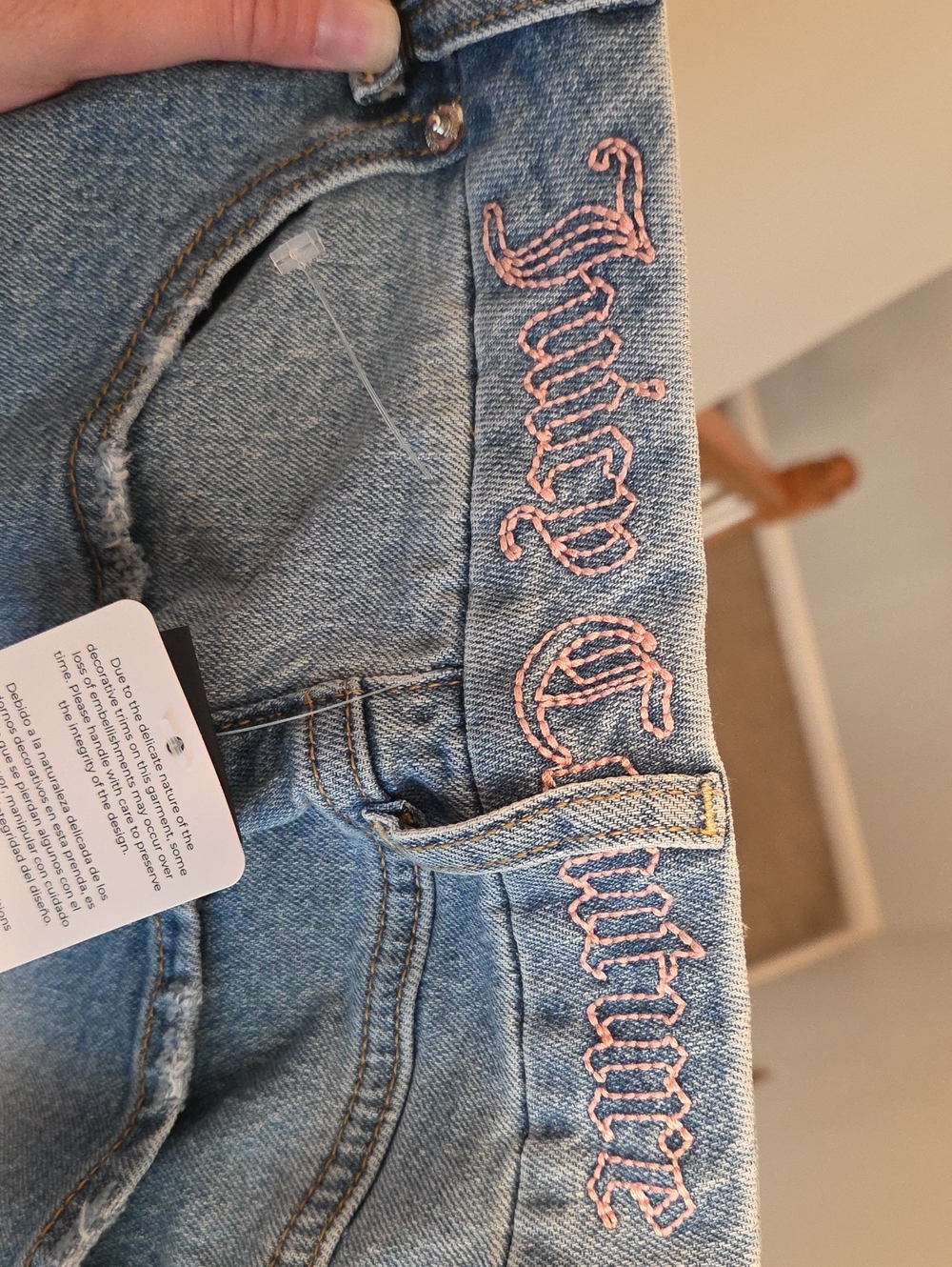 Light-wash denim shorts by Juicy Couture featuring a classic mid-rise - Picture 5 of 5